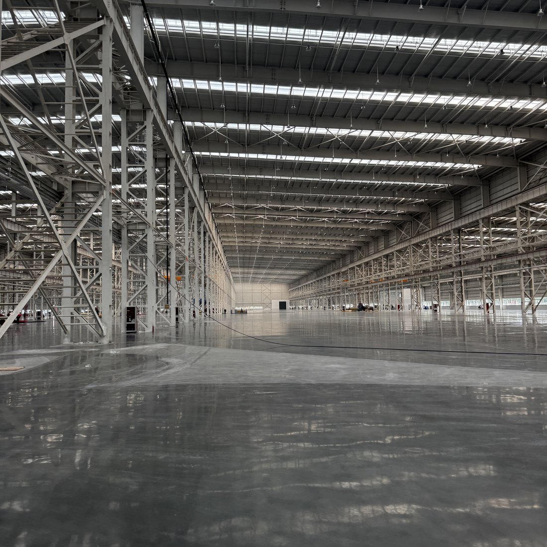 Interior of a large manufacturing hall at a supplier's plant