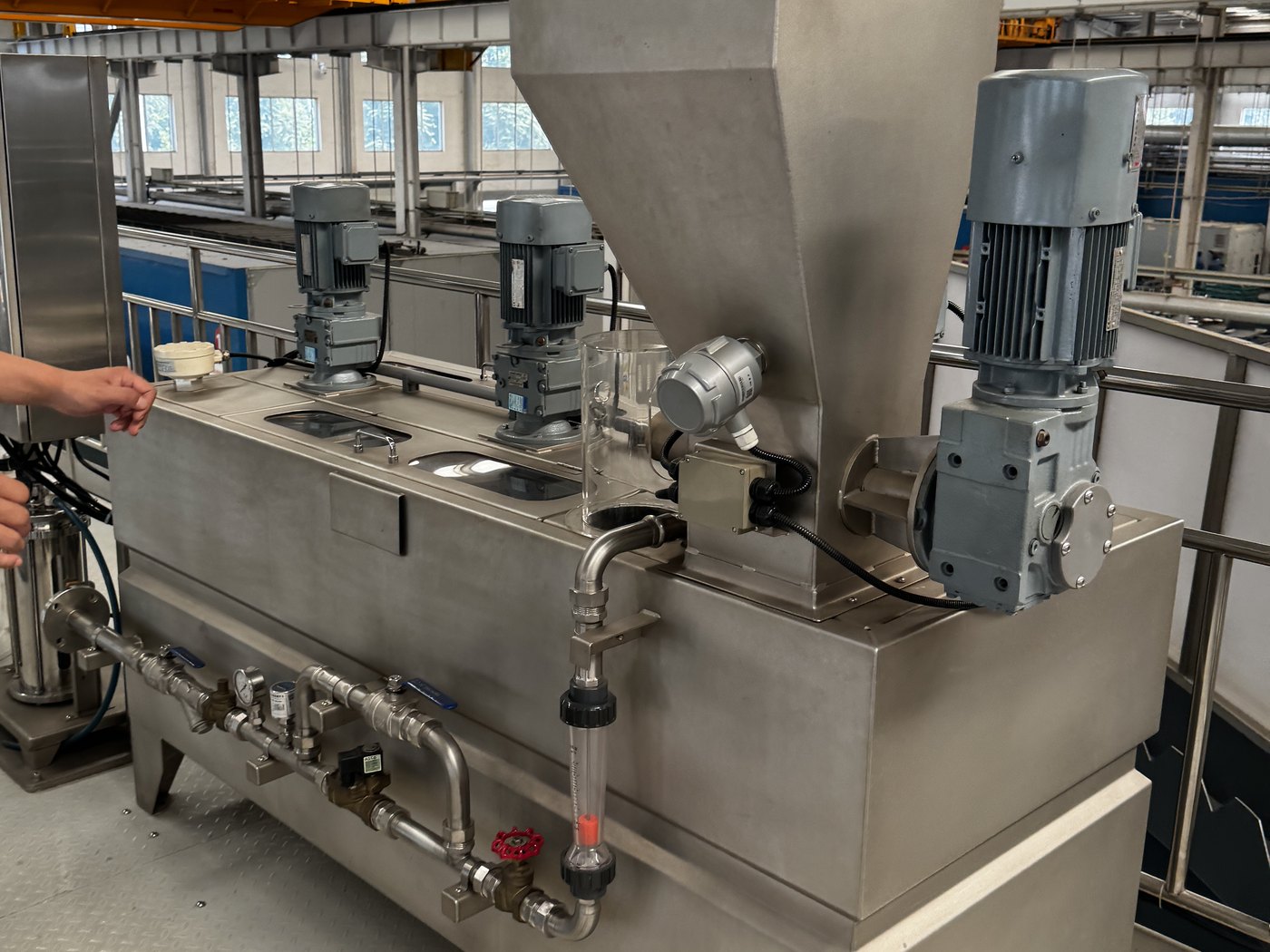 Chemical dosing and process equipment on a supplier's floor