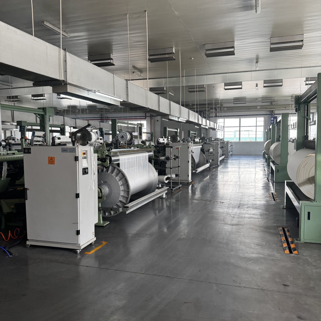 Production line running at a Chinese equipment manufacturer during a supplier visit